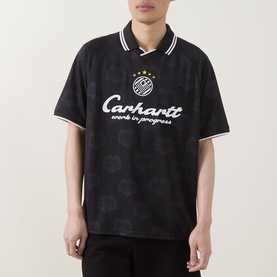 Model wearing Carhartt Heart Train Soccer Jersey in black with tonal pattern, white collar tipping and logo graphic print to chest