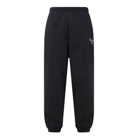 Carhartt Travon Script Logo Track Pants in Black, straight-leg nylon with elasticated waist, cuffed ankles and embroidered logo detail