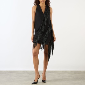Model wearing Max Mara Sportmax Galosce Fringed Mini Dress in black, sleeveless V-neck with cascading fringe, styled with black pointed heels.