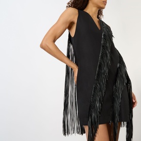 Model wearing Max Mara Sportmax Galosce Fringed Mini Dress in black, with V-neckline, sleeveless cut and layered fringe embellishment