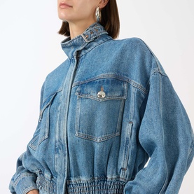 Model wearing Max Mara Sportmax Bussola Denim Bomber Jacket in Midnight Blue with stand collar, chest pockets and front zip