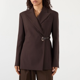 Model wearing Max Mara Sportmax cocoa blazer jacket with side buckle belt detail, styled with wide-leg trousers