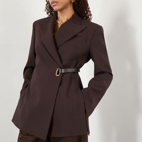 Model wearing Max Mara Sportmax cocoa belted wrap jacket with notched lapel and D-ring leather belt detail