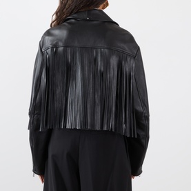 Model wearing Max Mara Sportmax Vicario Fringed Leather Jacket in black, back view showing long fringe yoke detail, cropped length, styled with black