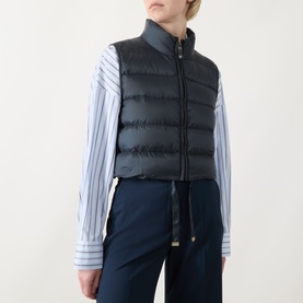 Model wearing Max Mara Cube Favilla Padded Gilet in midnight blue, styled with a striped shirt and navy trousers