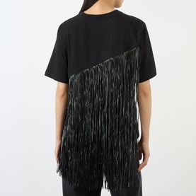Model wearing Max Mara Sportmax nero cotton T-shirt, rear view showing diagonal black polyester fringe detail across back.