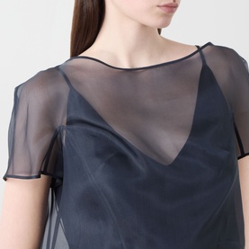 Model wearing Piano Forte Mela Organza Top in Midnight Blue, sheer silk organza layer over cami base, round neckline, short sleeves