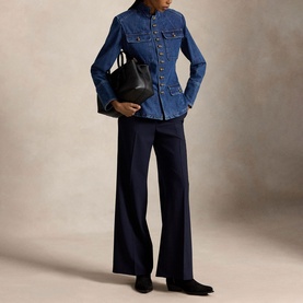 Model wearing Polo Ralph Lauren Roserea Wash denim blazer with navy wide-leg trousers, styled with black tote bag and black loafers.