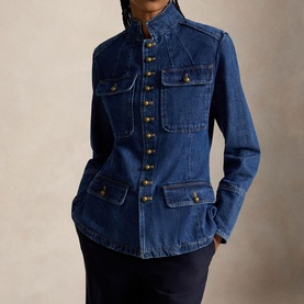 Model wearing Polo Ralph Lauren Roserea Wash denim blazer with gold button detail, four patch pockets, styled with navy trousers