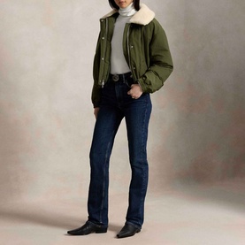 Model wearing Polo Ralph Lauren New Olive bomber coat with shearling collar, styled with grey roll-neck, dark jeans and black boots