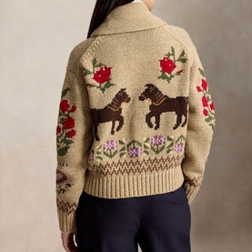 Model wearing Polo Ralph Lauren multi cardigan, back view, featuring horse and floral intarsia knit pattern on oatmeal ground
