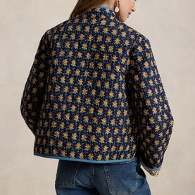 Model wearing Polo Ralph Lauren Navy Multi floral jacquard jacket, rear view, styled with blue jeans