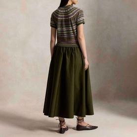 Model wearing Polo Ralph Lauren Hybrid Fair Isle Dress in Olive Multi, rear view, Fair Isle knit bodice, flared cotton skirt, styled with lace-up