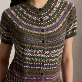 Model wearing Polo Ralph Lauren Hybrid Fair Isle Flared Dress in Olive Multi, featuring short sleeves, buttoned bodice and Fair Isle knit pattern