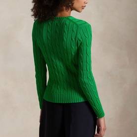 Model wearing Polo Ralph Lauren Preppy Green cable-knit jumper, shown from behind, paired with navy trousers.