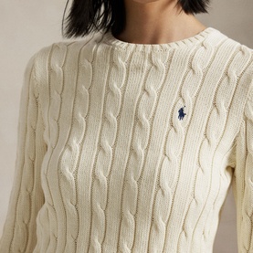 Model wearing Polo Ralph Lauren Authentic Cream cable-knit jumper with crew neck and embroidered navy pony logo