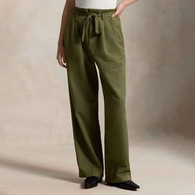 Model wearing Polo Ralph Lauren Belted Pleated High-Rise Straight Leg Trousers in olive, featuring self-belt and wide-leg silhouette