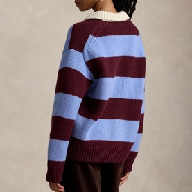 Model wearing Polo Ralph Lauren knitwear in Harvardwne, burgundy and blue wide rugby stripes, cream collar, back view