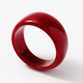 Mint Velvet red high-gloss resin bangle with wide domed band, one size