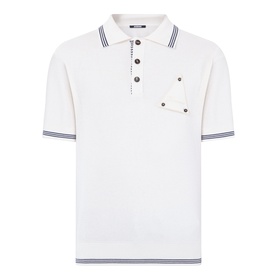 Jacquemus white polo shirt with navy tipping on collar and cuffs, chest pocket, and three-button placket