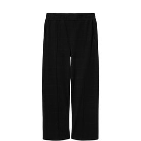 Black wide-leg trousers with elasticated waistband and front seam detail, laid flat