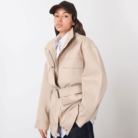 Model with Max Mara Weekend Rago Corduroy Cap in brown, styled with a belted beige jacket and blue shirt.