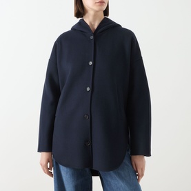 Model wearing Max Mara S Midnight Blue wool hooded coat with button front, styled with light blue jeans
