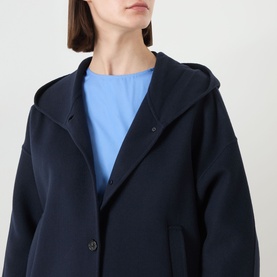 Model wearing Max Mara S Midnight Blue hooded wool coat with button fastening, styled with a light blue top.