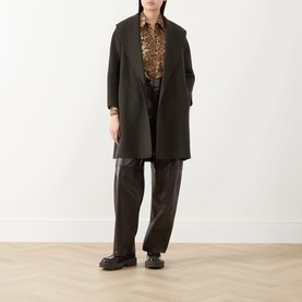 Model wearing Max Mara S kaki virgin wool coat, styled with leopard-print shirt, dark leather trousers and black chunky loafers