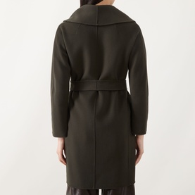 Model wearing Max Mara S kaki virgin wool coat, shown from rear, featuring wide lapels and self-tie belt