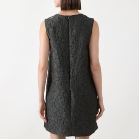 Model wearing Max Mara S Vicolo Jacquard Mini Shift Dress in dark green, rear view showing zip fastening and textured jacquard design