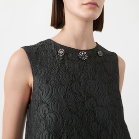 Model wearing Max Mara S Vicolo Jacquard Mini Shift Dress in dark green with detachable jewel embroidery at crew neckline, sleeveless