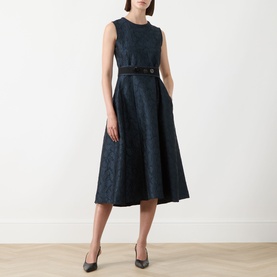 Model wearing Max Mara S midnight blue sleeveless jacquard midi dress with belted waist and full A-line skirt, styled with black heels.