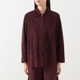 Model wearing Max Mara S Gocce Suede Jacket in red with shirt collar, front button fastening, and matching trousers
