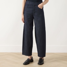 Model wearing Max Mara S Midnight Blue wide-leg jeans in cotton, styled with black leather loafers