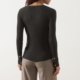 Model wearing Max Mara S Disegno Ribbed-Knit Sweater in kaki, back view, boat neck, long sleeves with gold jewel buttons at cuffs, styled with taupe