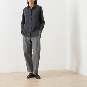 Model wearing Max Mara S Opera Patch Pocket Shirt in dark grey wool with point collar, paired with grey tapered trousers and black loafers