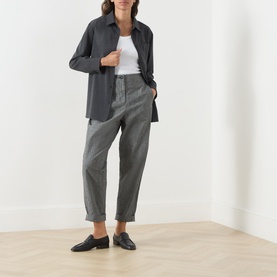 Model wearing Max Mara S Opera Patch Pocket Shirt in dark grey wool with point collar, styled with grey trousers and black loafers.