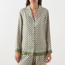 Model wearing Max Mara S Dice Silk Pyjama Shirt in Kaki Dice, featuring archival dice print, Cuban collar and long sleeves, styled with matching