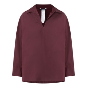Burgundy long-sleeve pullover shirt with open V-collar, relaxed fit, and structured cuffs, shown as flat lay