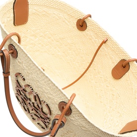 Loewe Anagram Medium Basket Bag in natural and black, woven iraca palm with tan leather trim, embossed anagram logo detail, open top view