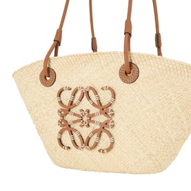 Loewe Anagram Woven Small Basket Bag in natural/tan, handwoven iraca body with embroidered calfskin Anagram motif and tan leather top handles.