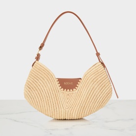 Loewe raffia shoulder bag in natural with tan calfskin strap and triangular leather logo patch, gold-tone hardware