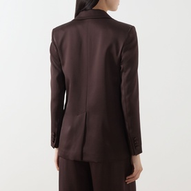 Model wearing Max Mara Studio chocolate blazer, rear view, styled with matching wide-leg trousers