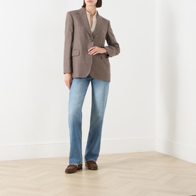 Model wearing Max Mara Studio Navy Various wool blazer, styled with light blue straight-leg jeans and brown loafers.