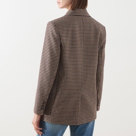 Model wearing Max Mara Studio navy houndstooth wool blazer, rear view, styled with light blue jeans