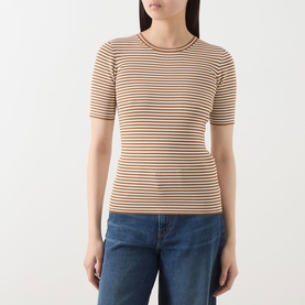 Model wearing Max Mara Studio caramel white stripe ribbed short-sleeve top, styled with blue denim jeans.