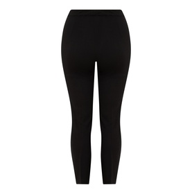 Model wearing Persona black slim-fit trousers, rear view, viscose-blend fabric with a smooth finish and ankle-length cut.