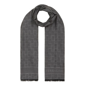 Salvatore Ferragamo Monogram Jacquard Scarf in charcoal, oblong style with all-over logo jacquard pattern and frayed trim ends.