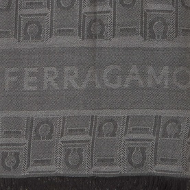 Salvatore Ferragamo Monogram Jacquard Scarf in charcoal, featuring tonal logo jacquard pattern and frayed trim detail.
